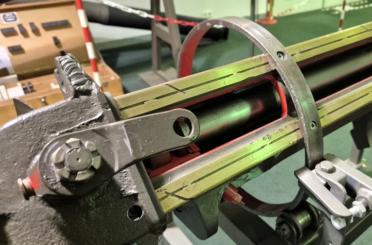 Arm voor verbinding schuif-draaiklep aan elevatieinrichting.