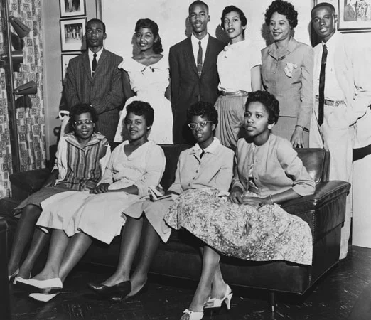 Daisy Bates (standing, second from right) and the Little Rock Nine.