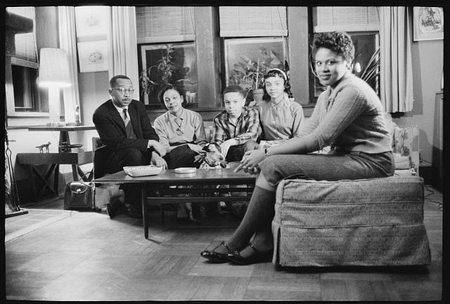 Little Rock Nine member Minnijean Brown (front, right) with Clark family.