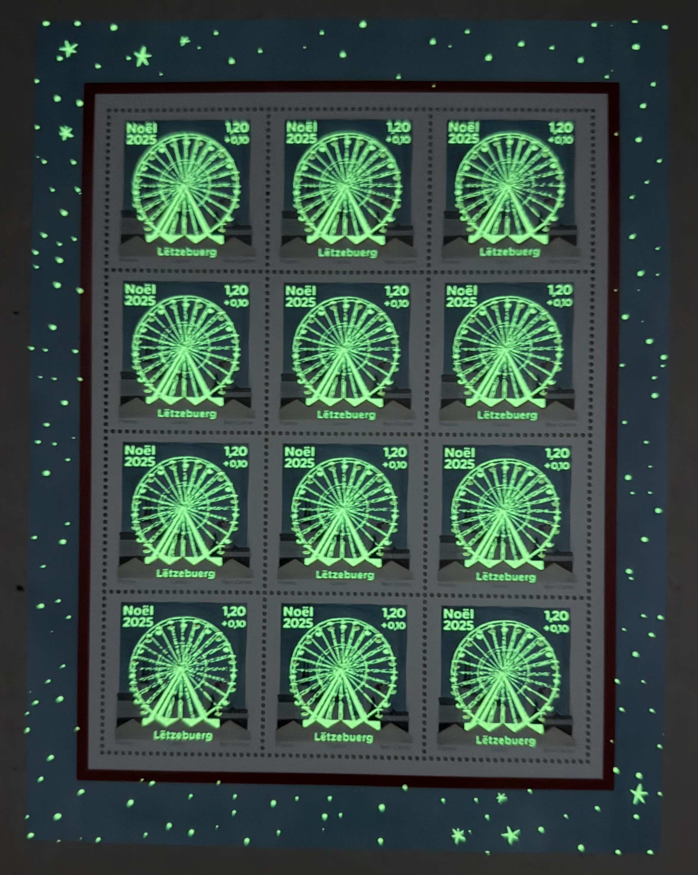 Christmas 2025 Luxembourg City sheet — glowing in the dark, the Ferris wheel lights up