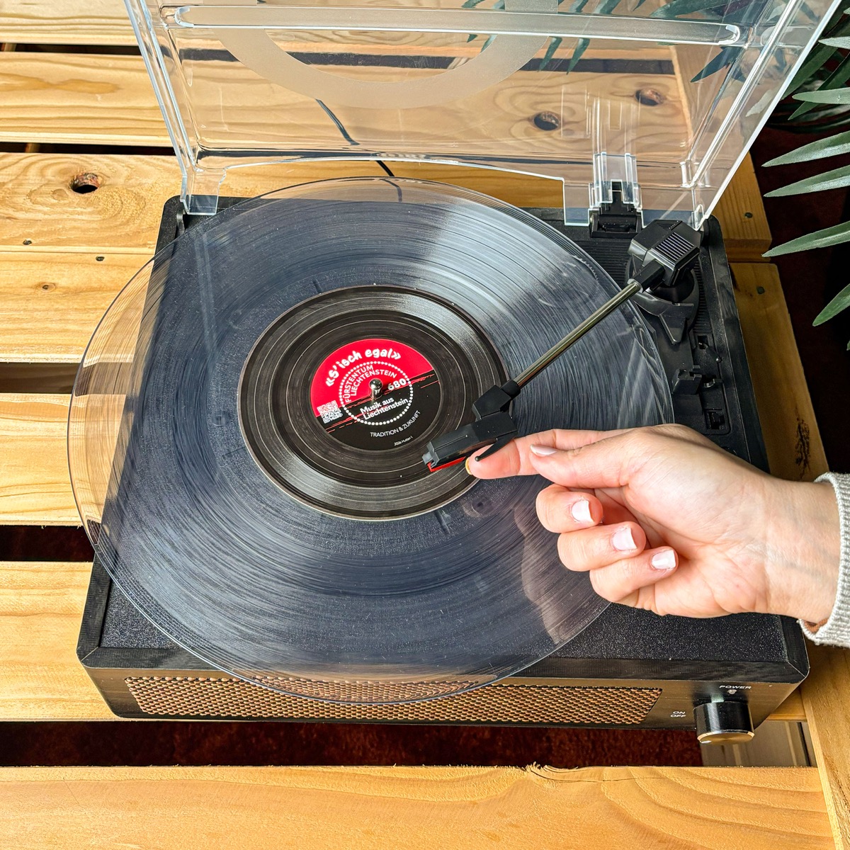 How to play the Liechtenstein music stamp — step 3: lower the needle and listen