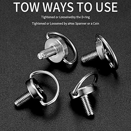 Vier D-Ring-Bolzen auf schwarzem Hintergrund